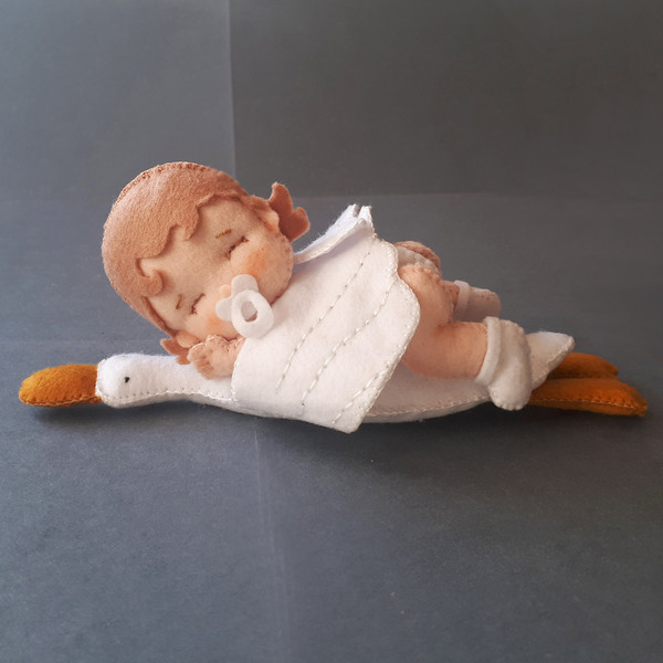 Baby doll and goose hugging sleep pillow sewing pattern.jpg