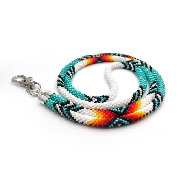 Native American style badge holder lanyard in turquoise and orange