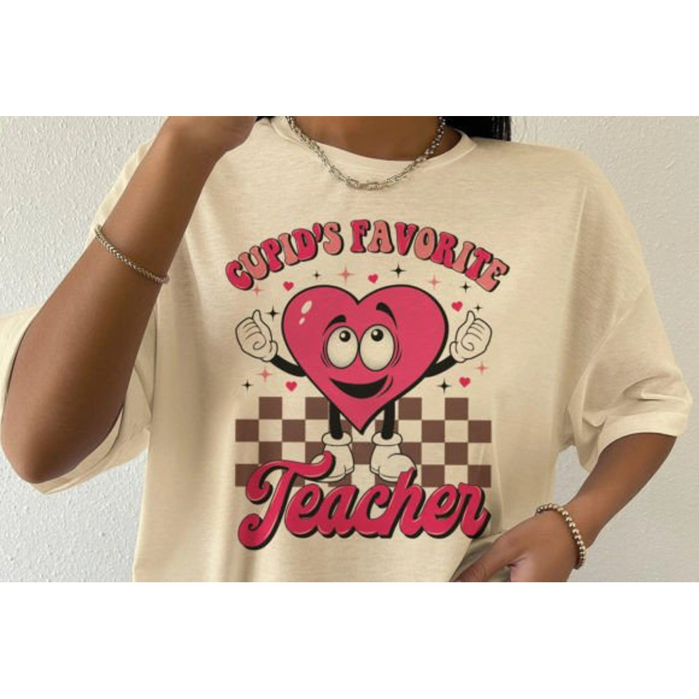 Cupids-Favorite-Teacher-SVG-PNG-Graphics-57623697-2-580x387.jpg