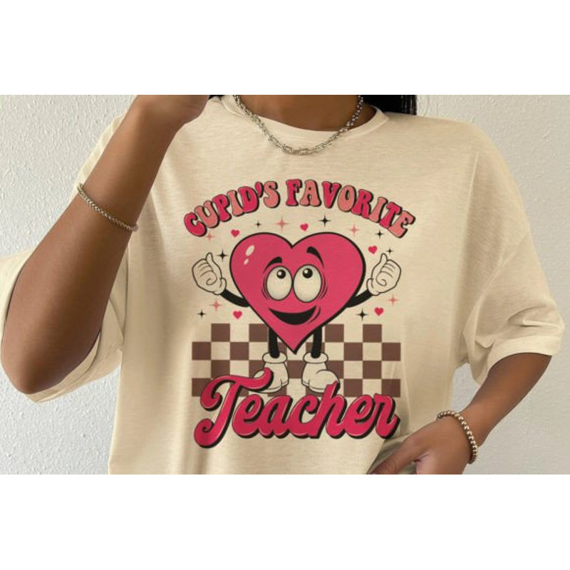 Cupids-Favorite-Teacher-SVG-PNG-Graphics-57623697-2-580x387.jpg