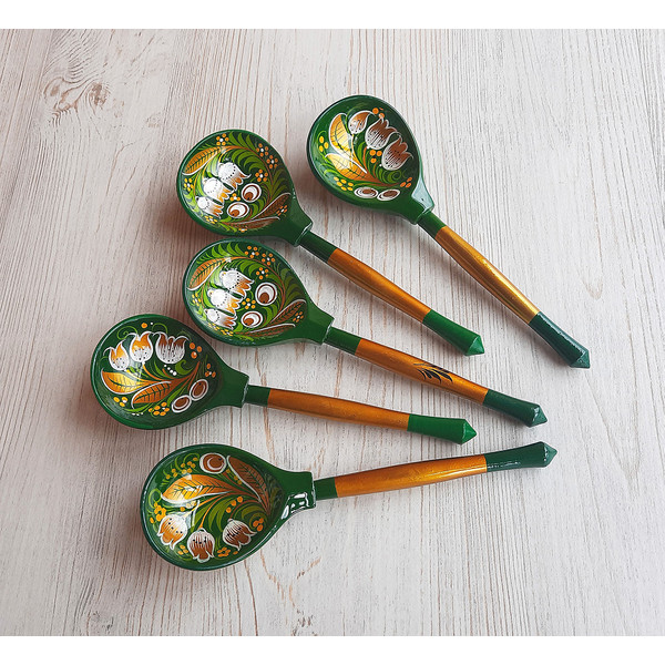 green gold wooden spoons khokhloma painting