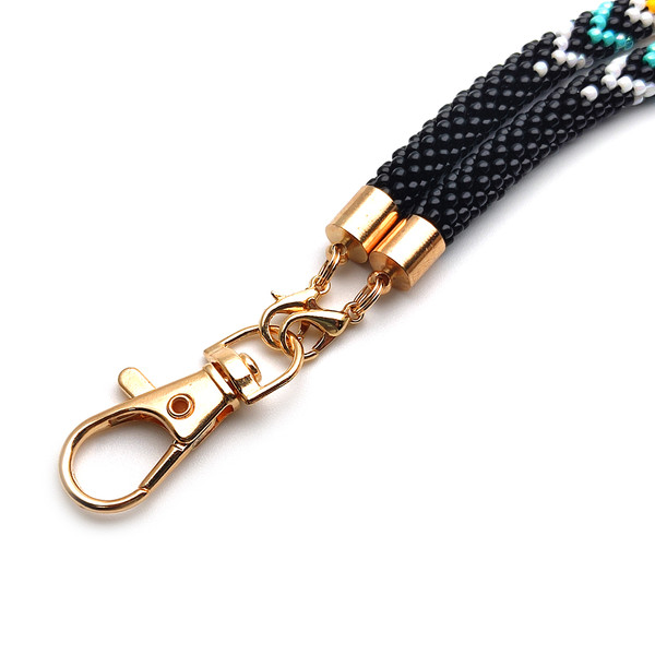 Soft and flexible beaded lanyard with lobster claw ID clip