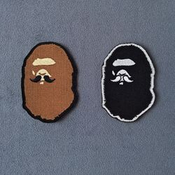 Bape Ape Head Sew on Patch Bathing ape patch with a mustache brown and black