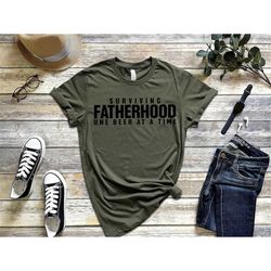 Surviving Fatherhood Shirt, Beer Lover Shirt, Fathers Day Gift, Funny Father Day Shirt, Funny Dad Gifts, New Dad Shirt,