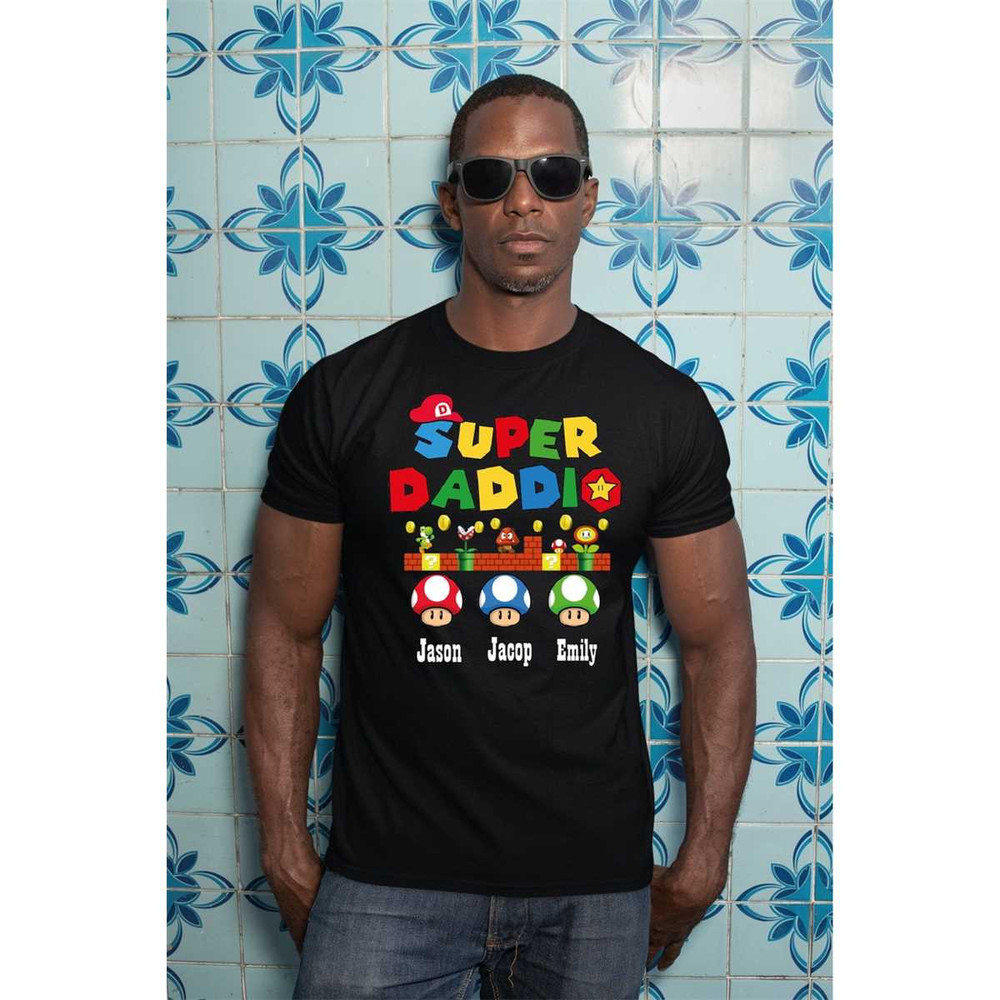 MR-305202311153-personalized-super-daddio-shirt-custom-kids-name-dad-shirt-image-1.jpg
