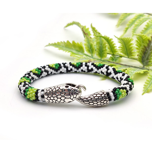 Modern and edgy beaded accessory in green and yellow