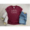 MR-3052023174016-this-is-a-cotton-or-cotton-polyester-mix-shirt-the-shirt-has-a-nhale-design-the-color-is-maroon.jpg