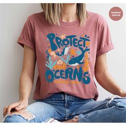 trendy oceans shirt, groovy sea animals graphic tees, earth day shirt, environmental vneck shirt, cute oceans toddler sh