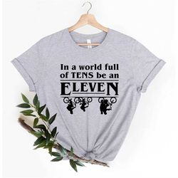 in a world full of tens be an eleven shirt, eleven things t-shirt, eleven gift for men women, be an eleven shirts, eleve
