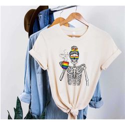 messy bun skeleton drinking coffee rainbow flag shirt, lgbtq pride shirt, rainbow lgbt shirt, skeleton coffee shirt, mes
