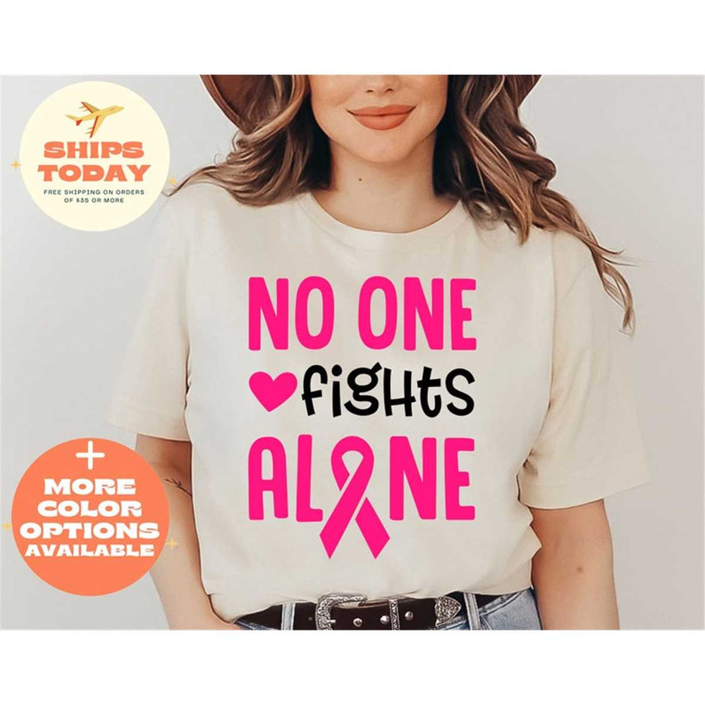 MR-3152023113456-no-one-fights-alone-shirt-breast-cancer-awareness-shirt-image-1.jpg