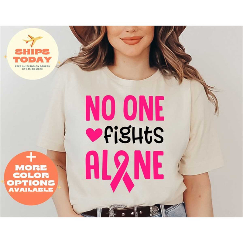 MR-3152023113456-no-one-fights-alone-shirt-breast-cancer-awareness-shirt-image-1.jpg
