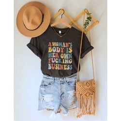 a woman's body is her own fucking business shirt, pro-choice t-shirt, roe v wade shirt, my body my choice shirt, feminis