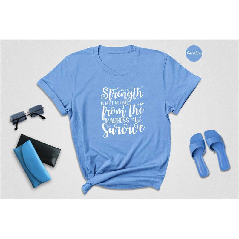 MR-16202381516-strength-is-what-we-gain-from-the-madness-shirt-positive-image-1.jpg