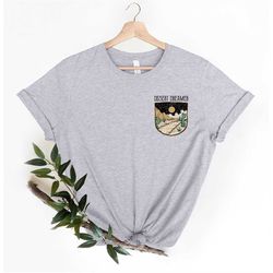 desert dreamer shirt, pocket size hiking tees, boho shirts, wilderness graphic tee, cool outdoors print, cactus art, hip