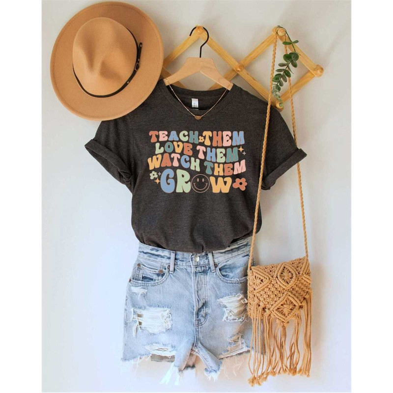 MR-16202312129-teach-them-love-them-watch-them-grow-t-shirt-funny-teacher-image-1.jpg