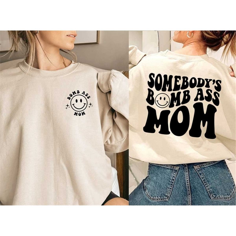 MR-162023125514-somebodys-bomb-ass-mom-sweatshirt-funny-mama-sweatshirt-image-1.jpg
