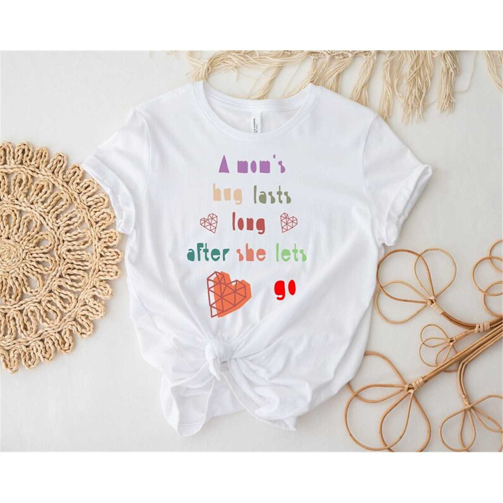 MR-162023174747-a-moms-hug-lasts-long-after-she-lets-go-shirt-gift-shirt-for-image-1.jpg