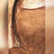 Golden-Buddha-is-a-modern-abstract-gold-acrylic-painting-with-3D-effect-for-the-interior-as-a-gift.jpg