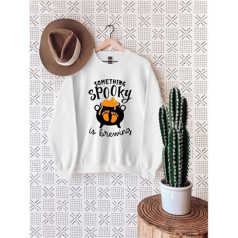 MR-362023191326-something-spooky-is-brewing-sweater-halloween-pregnant-image-1.jpg