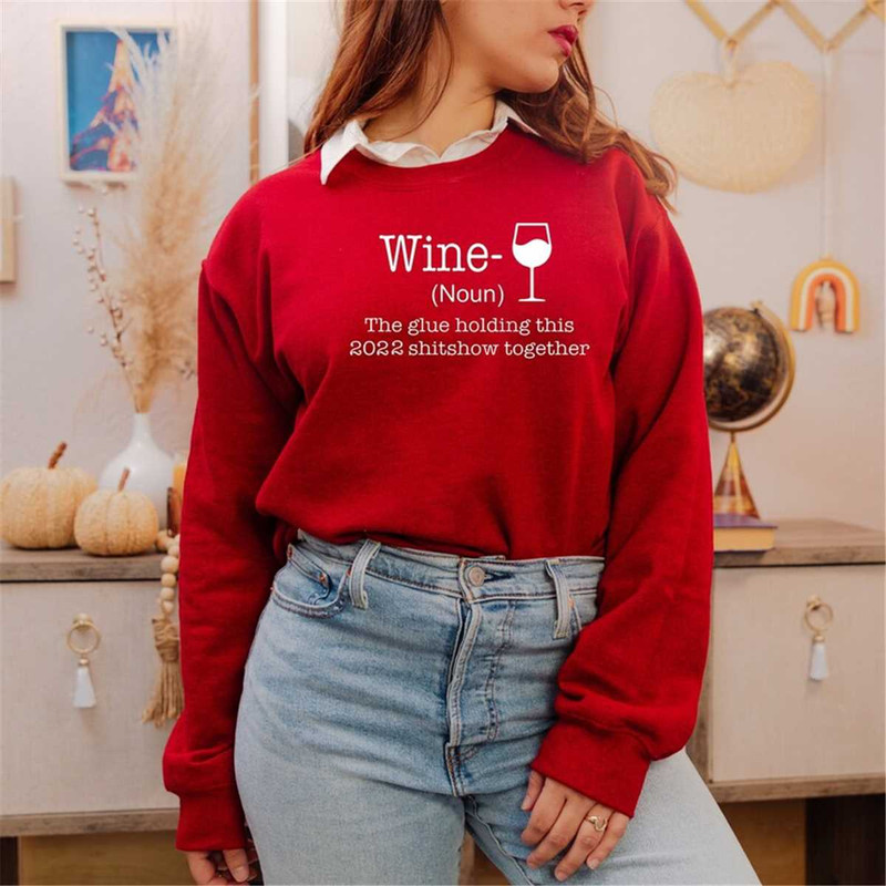 MR-362023201540-funny-christmas-sweatshirt-wine-noun-the-glue-holding-this-image-1.jpg