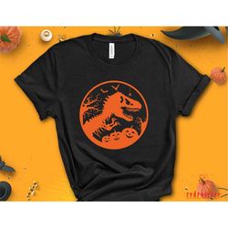 halloween shirt, saurus with pumpkin shirt, dinosaur halloween shirt, trick or treat dino shirt, saurus with pumpkin tee