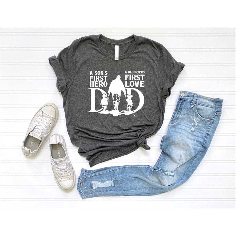 MR-46202311500-dad-a-sons-first-hero-a-daughters-first-love-shirt-image-1.jpg