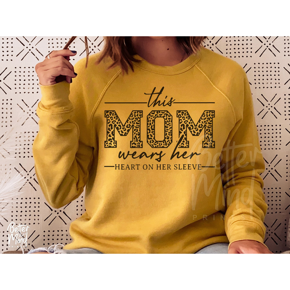 This Mom Wears Her Heart On Her Sleeve SVG, Mom Shirt Svg, Mom Life Svg, Mothers Day Svg, Mama Square Svg, Motherhood Svg, Blessed Mom Svg - 2.jpg