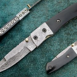 hand made folding knife , superior custom made damascus steel pocket knife