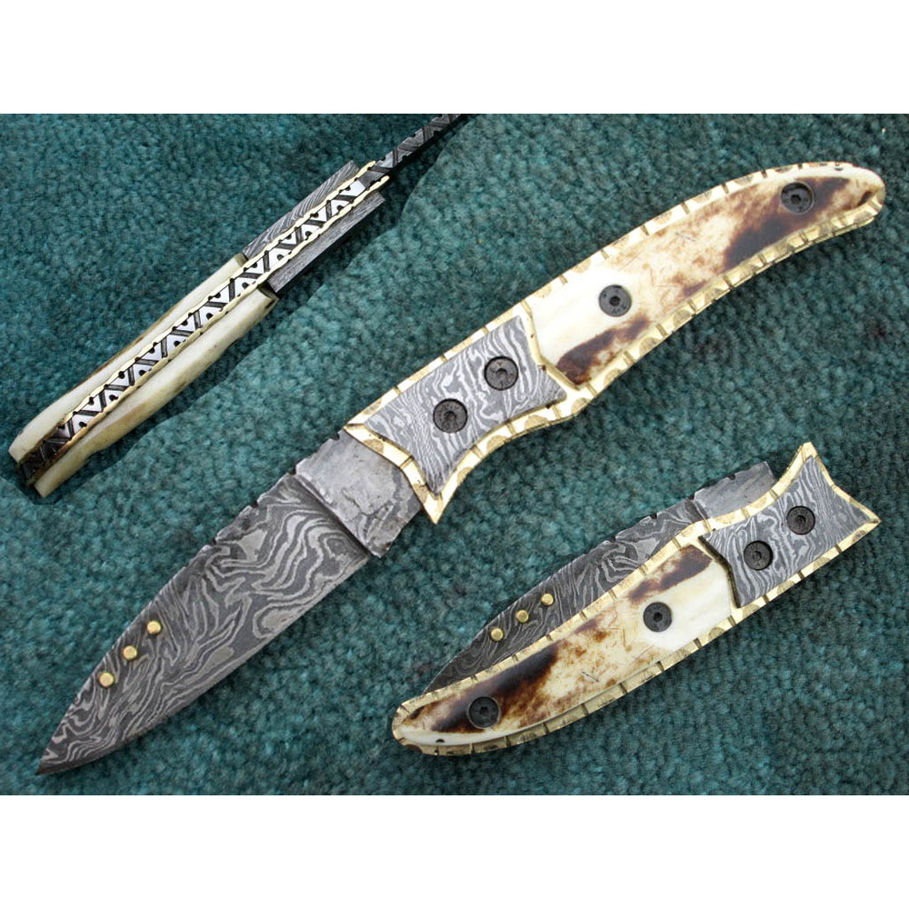 Damascus Pocket Knife.jpg