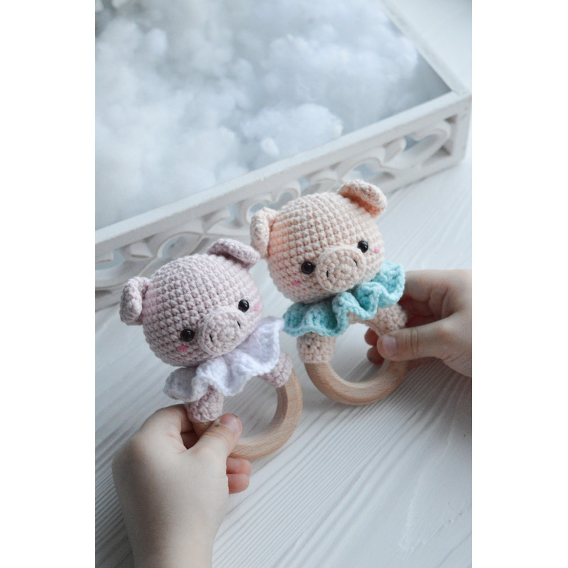 pig rattle on wooden ring.jpg