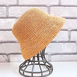 Crochet straw basket hat. Style hand-woven accessories.