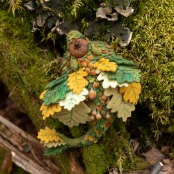Sleeping forest dragon with acorn hat and mushrooms