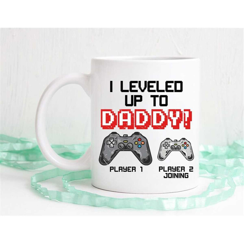 MR-5620239514-i-leveled-up-to-daddy-retro-mug-gamer-mug-player-1-player-image-1.jpg