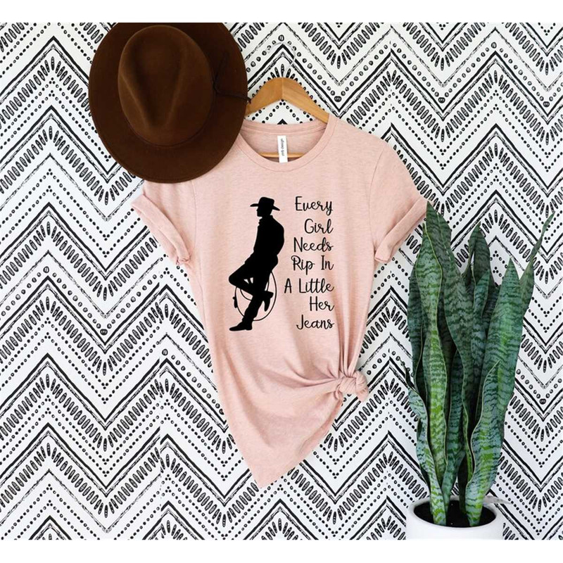 MR-56202382428-every-girl-needs-a-little-rip-in-her-jeans-shirtrip-tee-image-1.jpg
