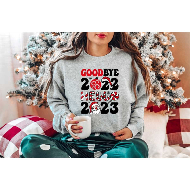 MR-762023204136-goodbye-2022-hello-2023-shirtnew-year-sweatshirtchristmas-image-1.jpg