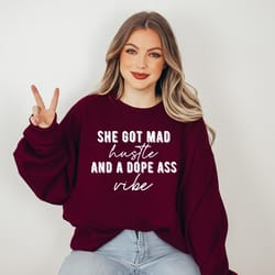 she got mad hustle and a dope vibe tee, motivation
