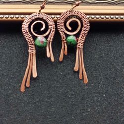 copper earrings 'angel wings'. ruby in zoisite.