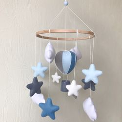 Baby mobile boy hot air balloon nursery. Travel decor blue gray stars and clouds. Baby shower gift