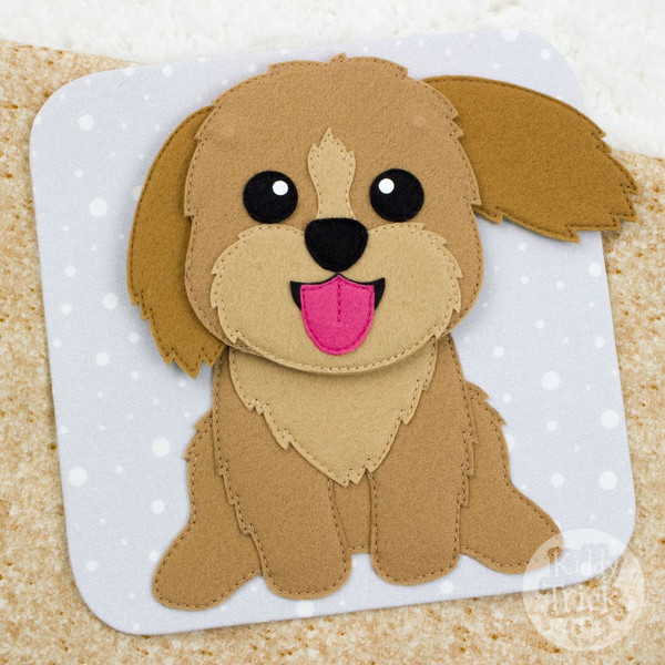 busy book page with felt Maltipoo puppy