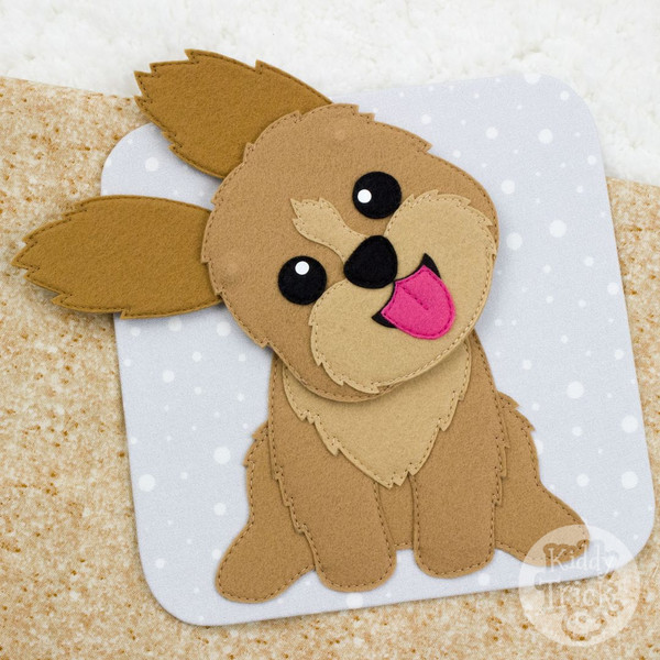 felt game with brown dog