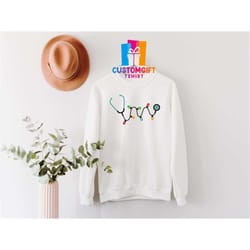 stethoscope sweatshirt, christmas shirt, doctor shirt, nurse shirt, christmas lights shirt, medical school shirt, nurser