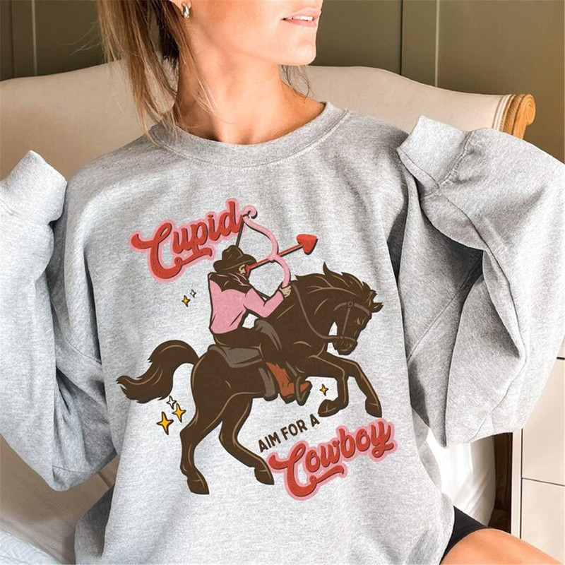 MR-126202319558-cupid-cowboy-sweatshirt-funny-valentines-crewneck-sweater-image-1.jpg