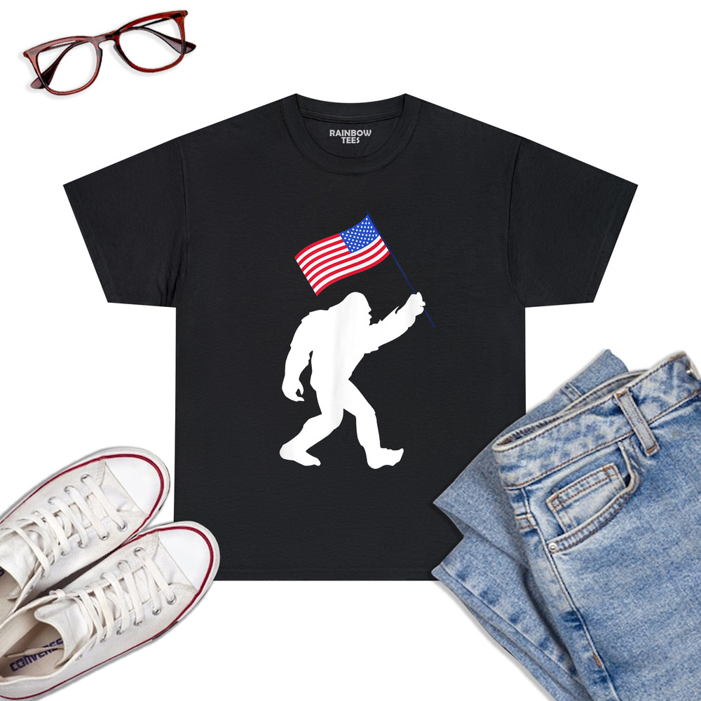 Bigfoot-With-American-Flag-Funny-4th-Of-July-T-Shirt-Black.jpg