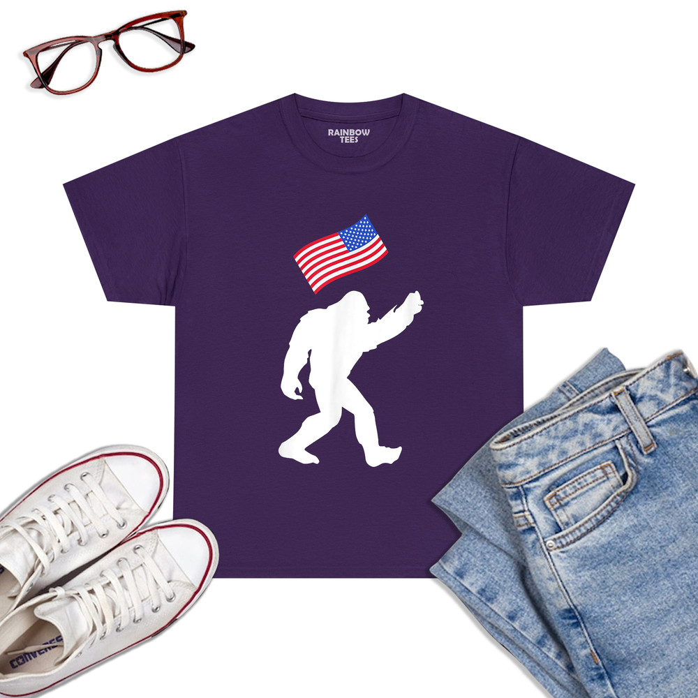 Bigfoot-With-American-Flag-Funny-4th-Of-July-T-Shirt-Purple.jpg