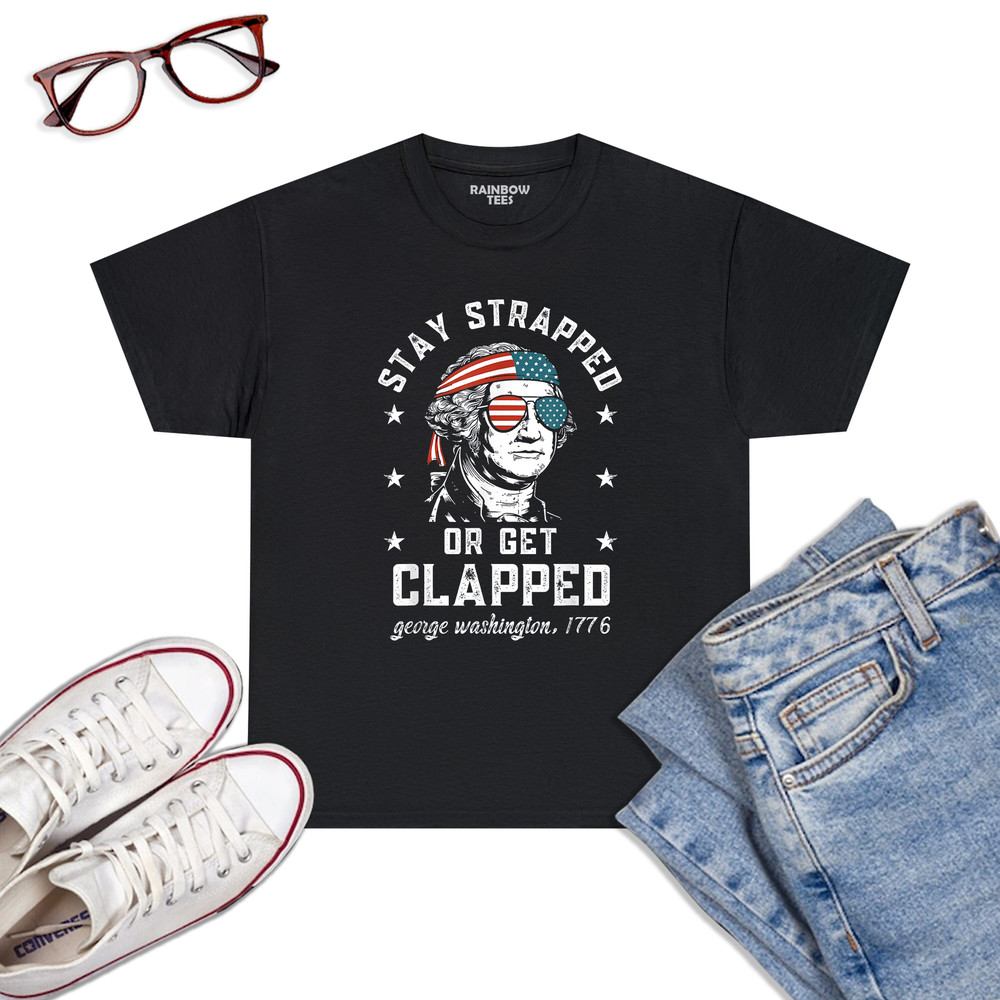 Stay-Strapped-Or-Get-Clapped,-George-Washington,4th-Of-July-T-Shirt-Black.jpg
