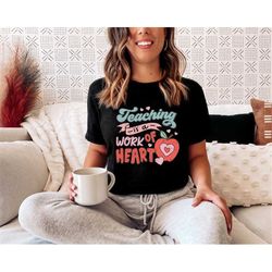 teaching is a work of heart t-shirt trendy teacher shirt happy new. 2022 school gift teacher graduation shirt