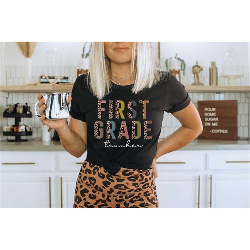 MR-1462023194858-first-grade-teacher-teacher-shirt-teacher-leopard-shirt-black.jpg