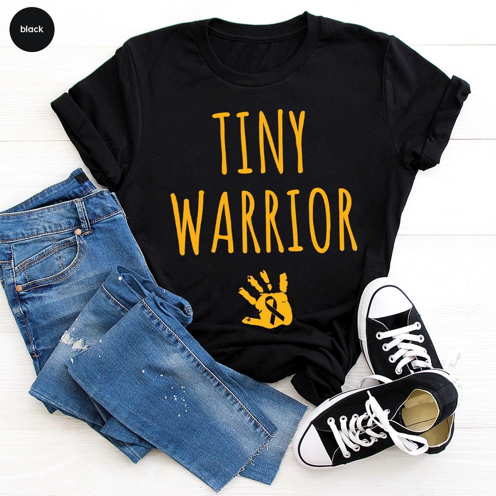 Tiny Warrior Gold Cancer Ribbon Graphic Tee, Childhood Cancer Crewneck Shirt, Mama of a Cancer Warrior Shirt, Pediatric Cancer Survivor Gift - 5.jpg