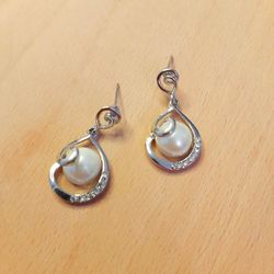 Silver spiral white pearl and crystals small earrings. Bridal swirl minimalist drop earrings. Sparkly little gift women.
